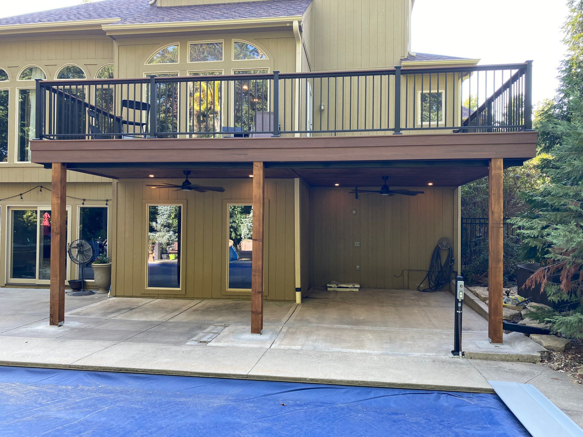 Second-story deck with under-deck ceiling, fans and recessed lighting